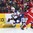 MONTREAL, CANADA - JANUARY 4: USA's Jack Roslovic #28 stick handles the puck past Russia's Sergei Zborovski #6 during semifinal round action at the 2017 IIHF World Junior Championship. (Photo by Matt Zambonin/HHOF-IIHF Images)

